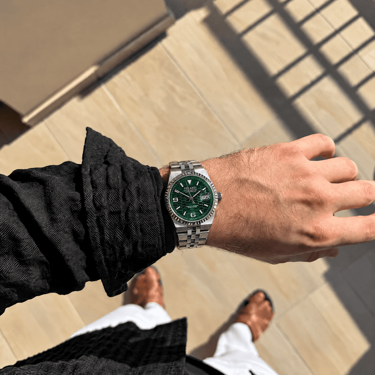 Landvel Silver - Green watch worn on the wrist, showing the dial and bracelet.