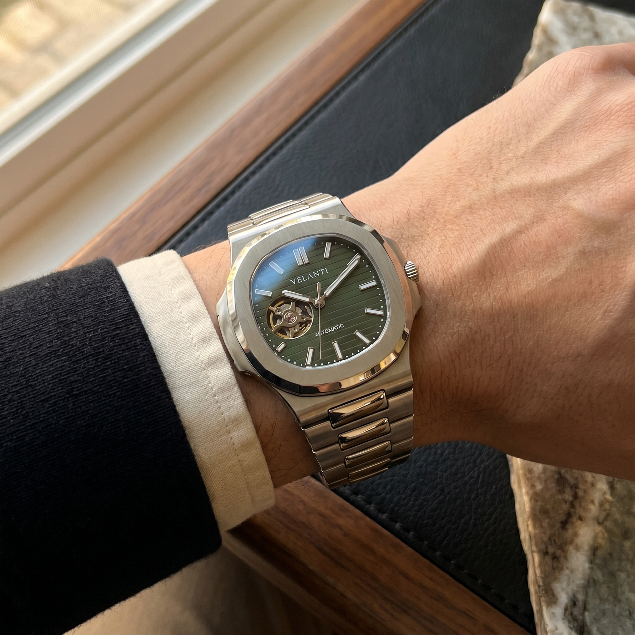 Nautilus-style automatic watch, Velanti Milano Nautvel Olive Green Open Movement worn on wrist photo 9