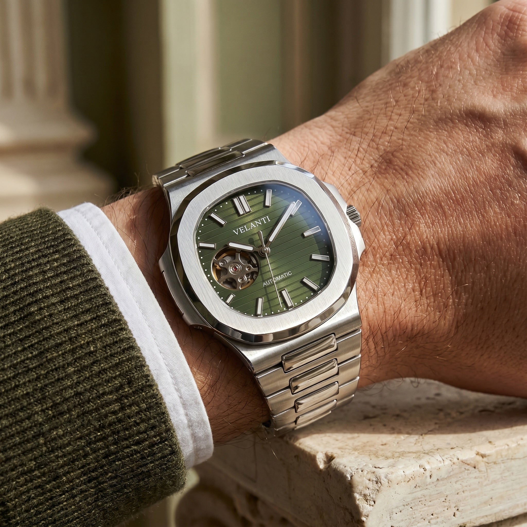 Nautilus-style automatic watch, Velanti Milano Nautvel Olive Green Open Movement worn on wrist photo 2
