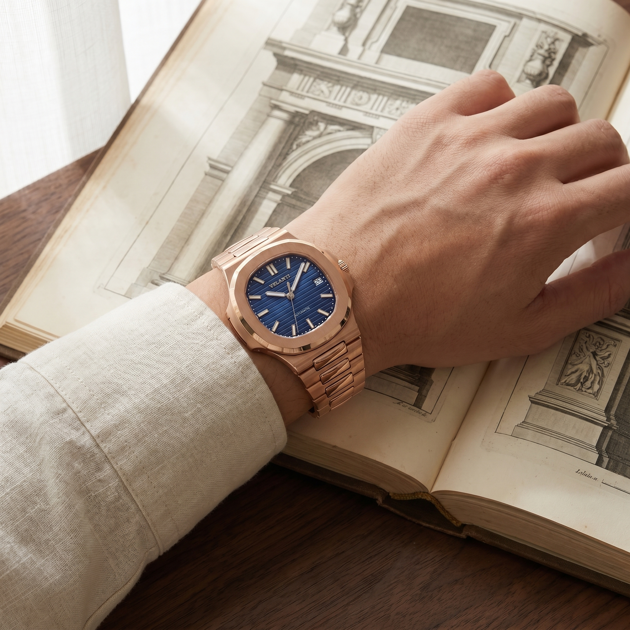 Nautilus-style automatic watch, Velanti Milano Nautvel Rose Gold Royal Blue worn on wrist photo 2