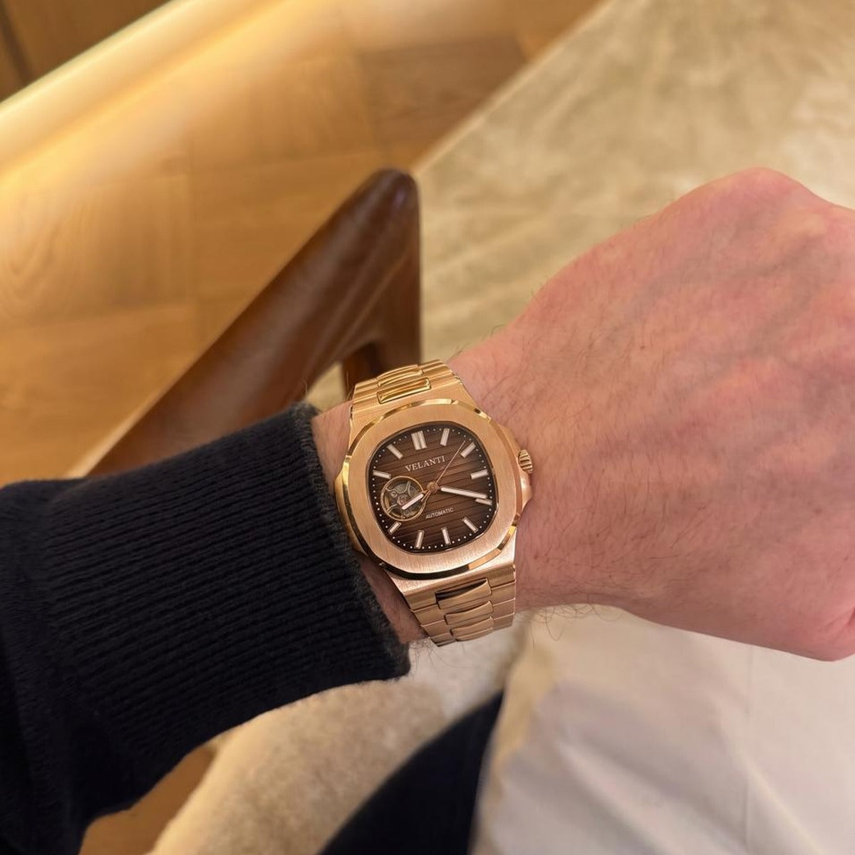 Customer wrist photo for Velanti Milano Nautvel Rose Gold Chocolate Open Heart review — warm lounge setting